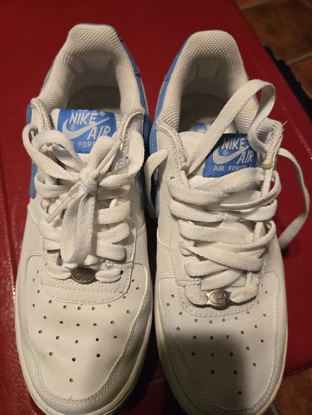 Nike Kids White Sneakers with Light Blue Accents